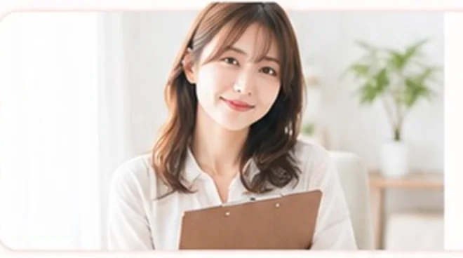 相談に対応する女性スタッフのイメージ